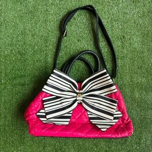 Hot pink Betsey Johnson quilted purse with black and white bow